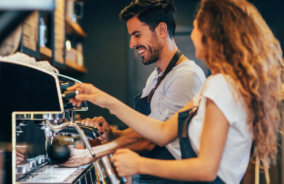 Baristas working in a cafe