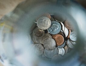 Money and coins in a jar