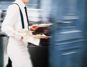 Waiter serving in a restaurant