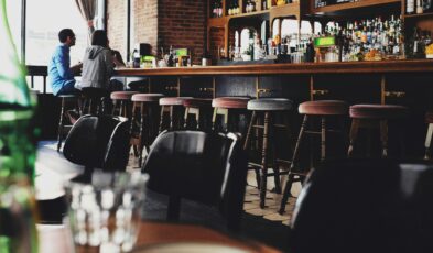 Empty chairs at a bar
